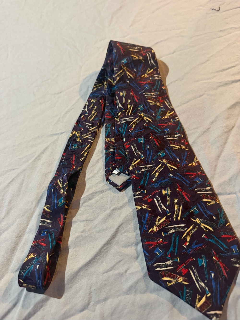 Men's Patterned Navy Silk Tie with Multicolor Accents